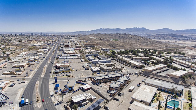 drone / aerial view featuring a mountain view