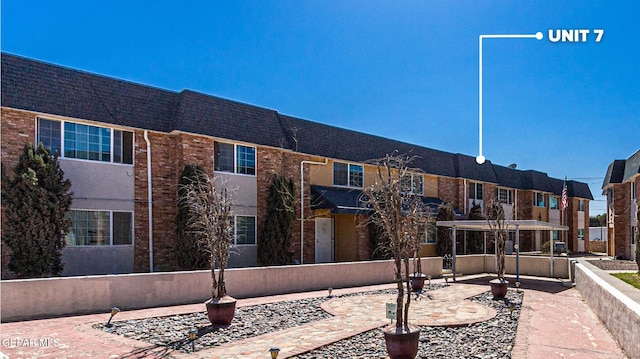 view of property's community featuring a patio area