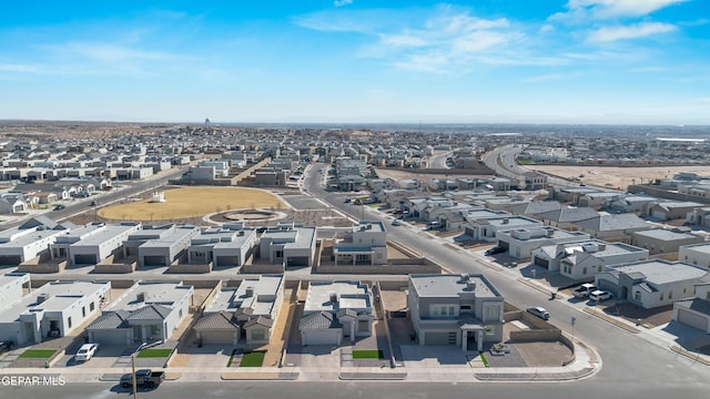 birds eye view of property with a residential view