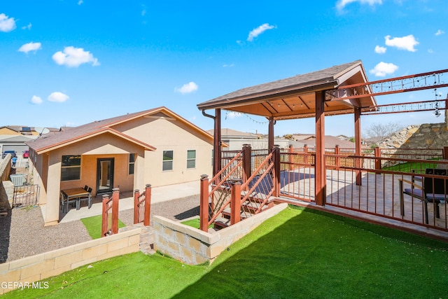 view of yard with a patio area and a fenced backyard