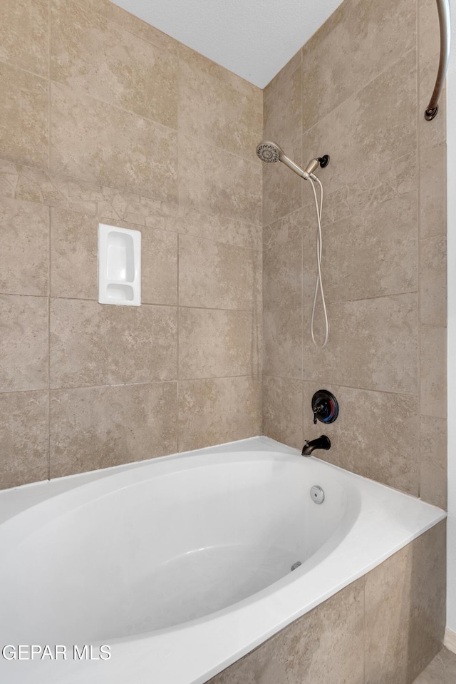 bathroom featuring bathtub / shower combination