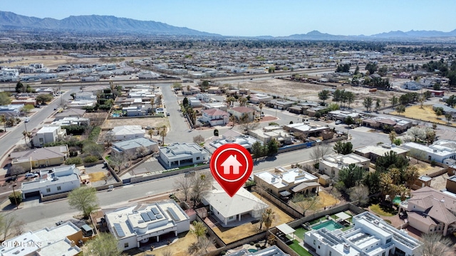 drone / aerial view featuring a mountain view and a residential view