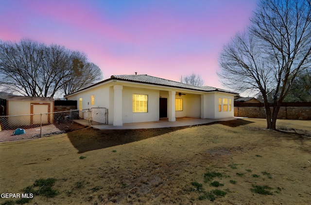 757 Maxey Marie Dr, El Paso, TX 79932 - view of front of property featuring a patio area, fence, a tiled roof, a gate, and stucco siding