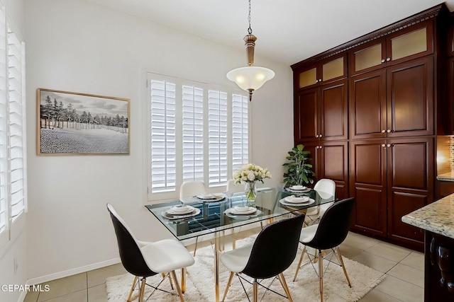 757 Maxey Marie Dr, El Paso, TX 79932 - dining area with light tile patterned floors and baseboards