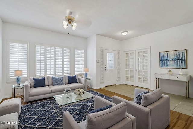 757 Maxey Marie Dr, El Paso, TX 79932 - living room featuring a ceiling fan, wood finished floors, and baseboards