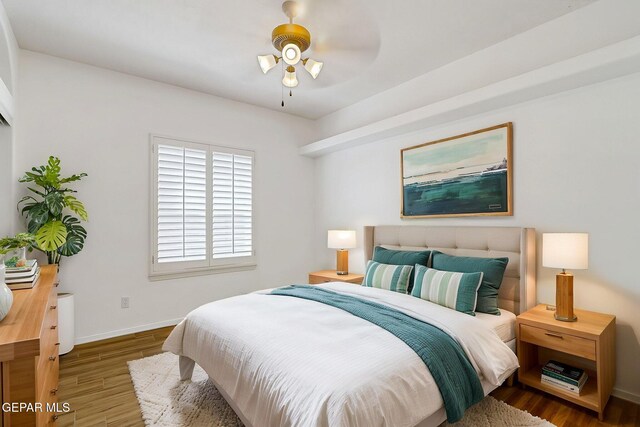 757 Maxey Marie Dr, El Paso, TX 79932 - bedroom featuring wood finished floors and baseboards