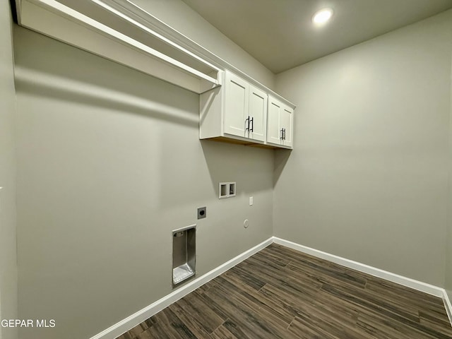 washroom featuring baseboards, hookup for a washing machine, hookup for a gas dryer, cabinet space, and electric dryer hookup