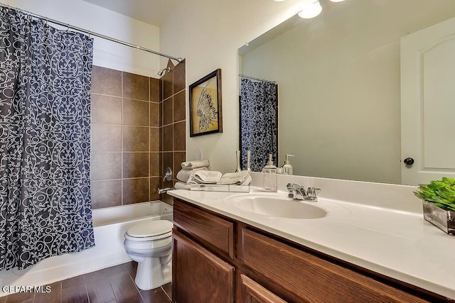 bathroom featuring vanity, toilet, shower / tub combo with curtain, and wood finished floors