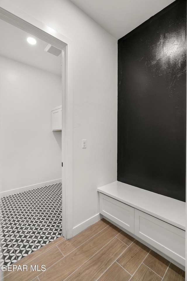 mudroom featuring recessed lighting, baseboards, and wood finish floors