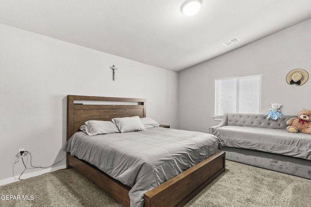 bedroom featuring baseboards, visible vents, lofted ceiling, and carpet floors