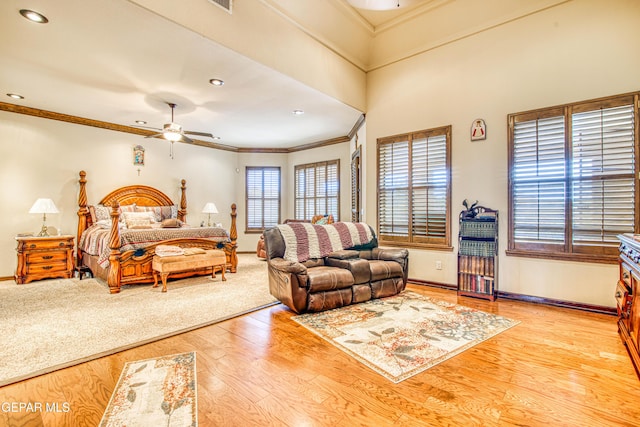 bedroom with baseboards, ornamental molding, recessed lighting, wood finished floors, and a ceiling fan