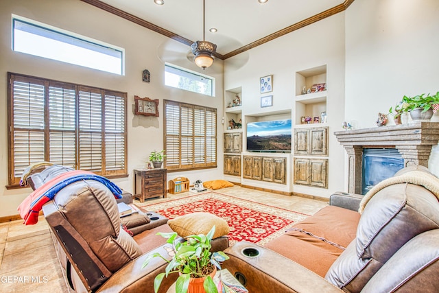 living room with built in shelves, baseboards, ornamental molding, recessed lighting, and tile patterned floors