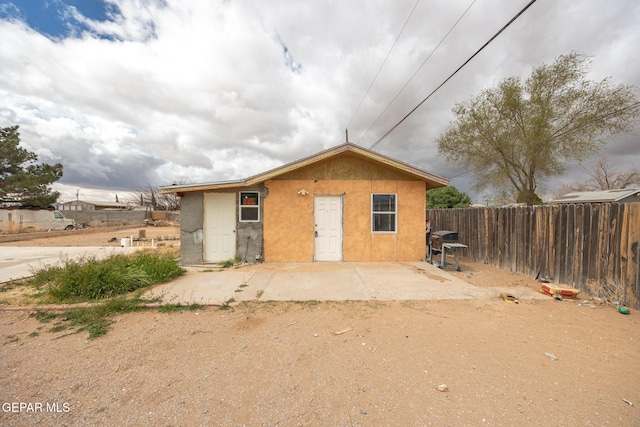 view of outdoor structure with fence