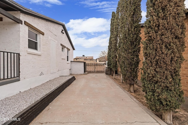 view of patio / terrace with a gate