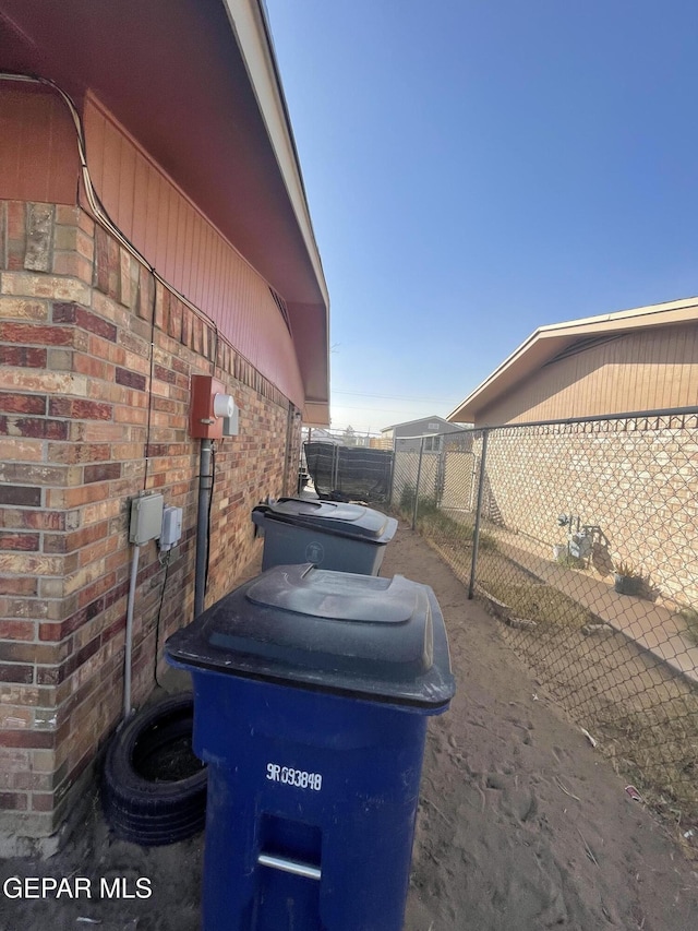 view of property exterior with fence