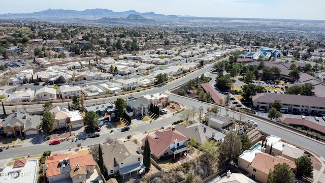 drone / aerial view featuring a mountain view and a residential view