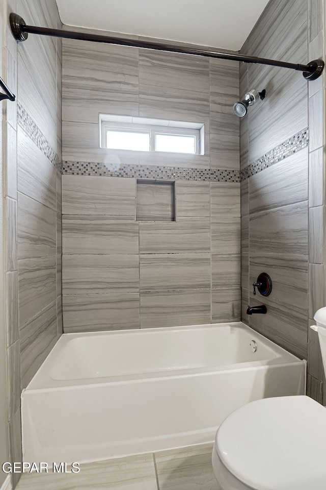 full bath featuring toilet and shower / bathtub combination