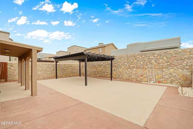 view of patio / terrace with a fenced backyard and a pergola