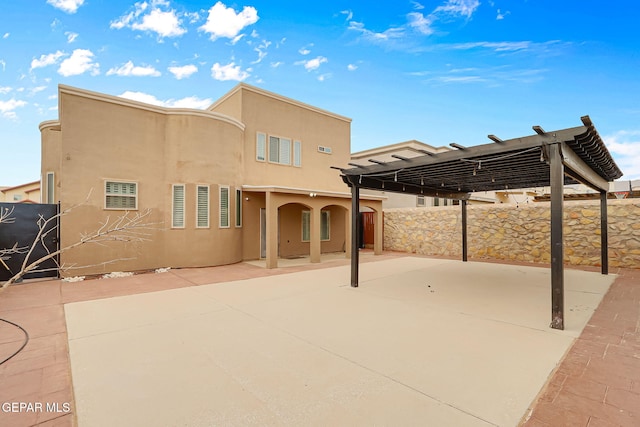 view of patio with fence