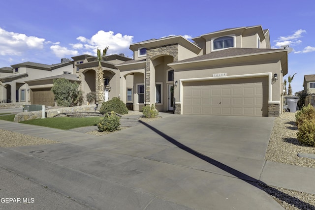 view of front facade with stucco siding, stone siding, concrete driveway, and an attached garage