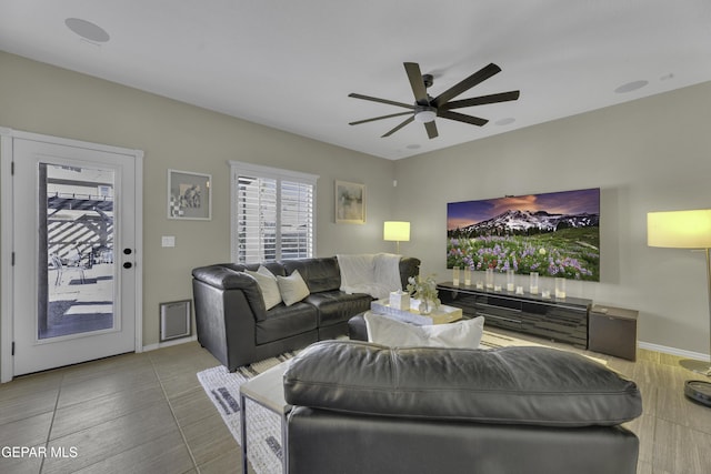 living room featuring ceiling fan