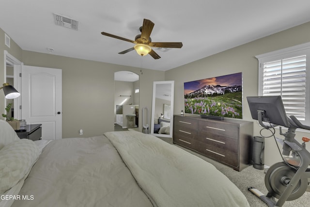 bedroom featuring visible vents, ceiling fan, and carpet floors