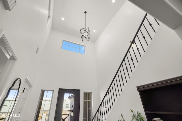 7402 Wooden Nickel Dr, El Paso, TX 79911 - foyer with stairs, a towering ceiling, recessed lighting, and a notable chandelier