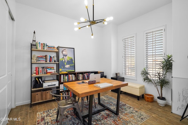 7402 Wooden Nickel Dr, El Paso, TX 79911 - home office featuring baseboards, wood tiled floor, and a chandelier