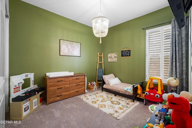 7402 Wooden Nickel Dr, El Paso, TX 79911 - carpeted bedroom with a chandelier