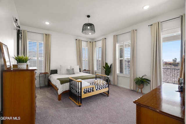 7402 Wooden Nickel Dr, El Paso, TX 79911 - carpeted bedroom featuring multiple windows, access to exterior, and recessed lighting