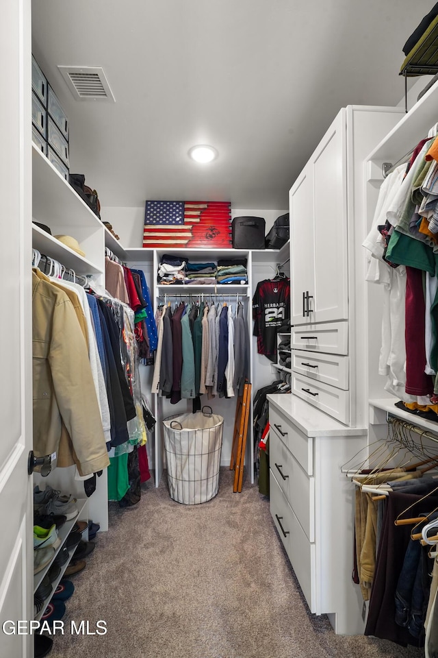 7402 Wooden Nickel Dr, El Paso, TX 79911 - walk in closet featuring light carpet and visible vents