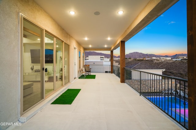 7402 Wooden Nickel Dr, El Paso, TX 79911 - view of patio / terrace with a balcony and a fenced in pool