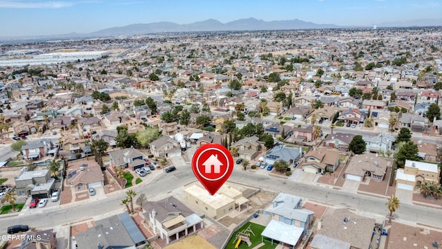 aerial view with a mountain view and a residential view