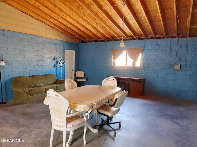 dining space with concrete flooring