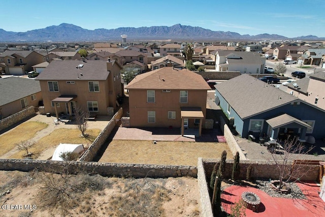 aerial view featuring a mountain view and a residential view