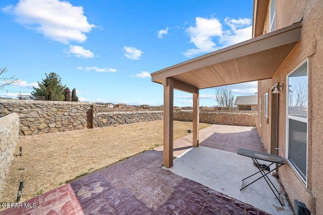 view of patio with a fenced backyard