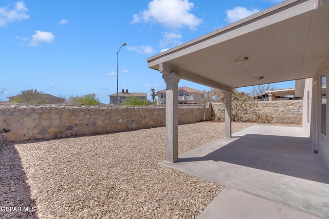 view of yard with a patio area and a fenced backyard