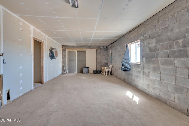 basement with concrete block wall