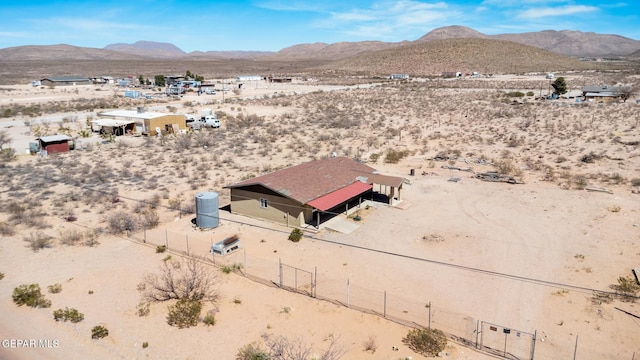 drone / aerial view with a desert view and a mountain view