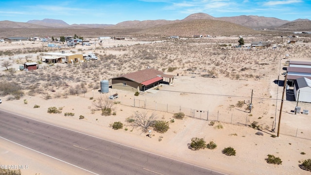 bird's eye view featuring a mountain view and a desert view