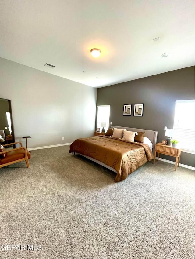 3897 Surmise St, El Paso, TX 79938 - carpeted bedroom featuring baseboards
