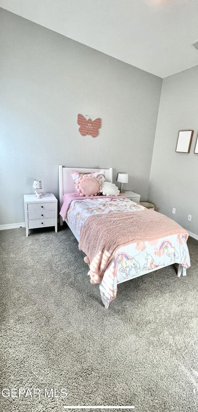 3897 Surmise St, El Paso, TX 79938 - bedroom with carpet flooring and baseboards