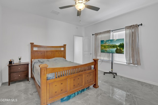 bedroom featuring marble finish floor, visible vents, baseboards, and ceiling fan