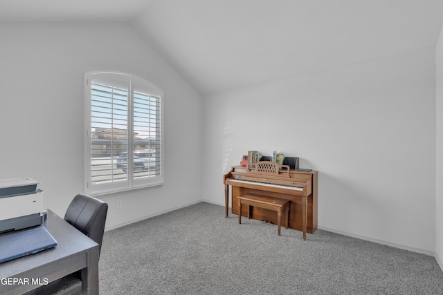 office space with carpet flooring and vaulted ceiling