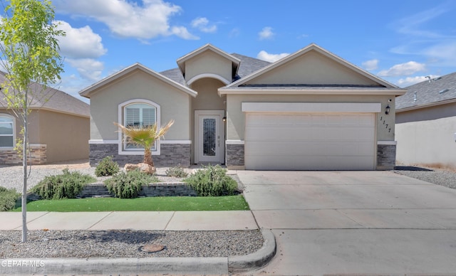 ranch-style house featuring an attached garage, stone siding, driveway, and stucco siding