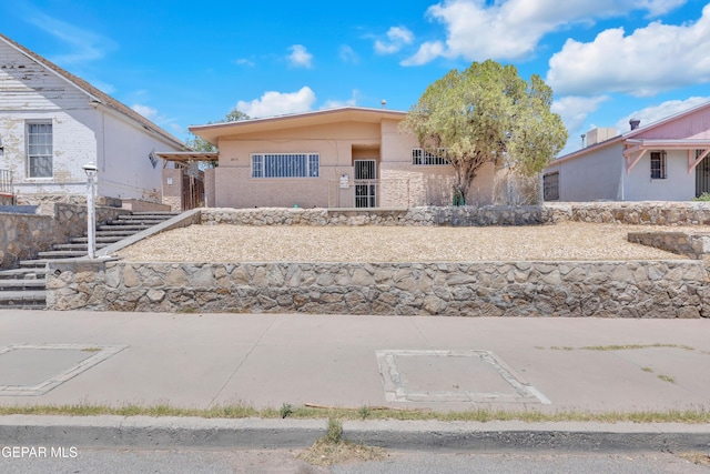 2413 Copper Ave Unit 79930, El Paso, TX 79930 - view of front of home with stairway and stucco siding