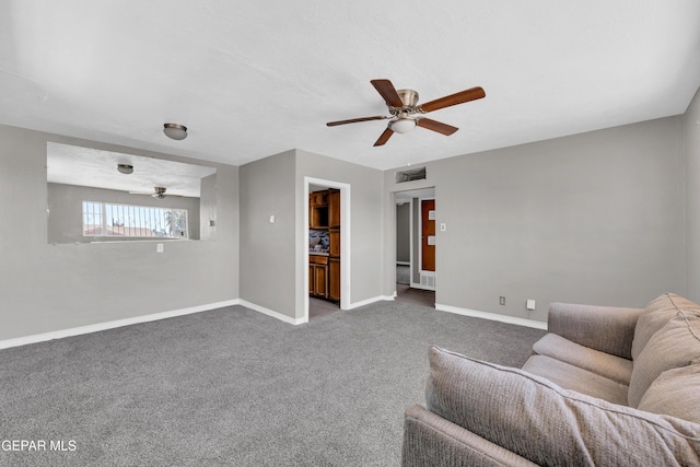 2413 Copper Ave Unit 79930, El Paso, TX 79930 - living room featuring a ceiling fan, carpet, and baseboards