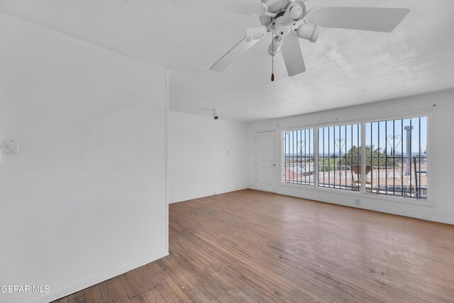 2413 Copper Ave Unit 79930, El Paso, TX 79930 - spare room featuring ceiling fan, hardwood / wood-style flooring, and baseboards