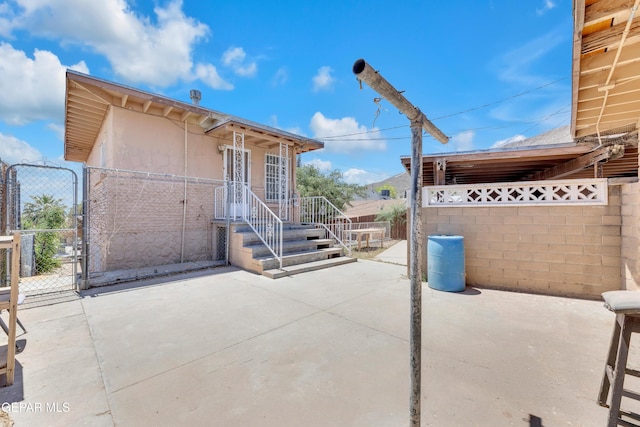 2413 Copper Ave Unit 79930, El Paso, TX 79930 - view of patio featuring a gate and fence