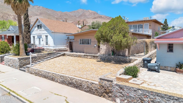 2413 Copper Ave Unit 79930, El Paso, TX 79930 - view of front of house featuring a patio and a mountain view